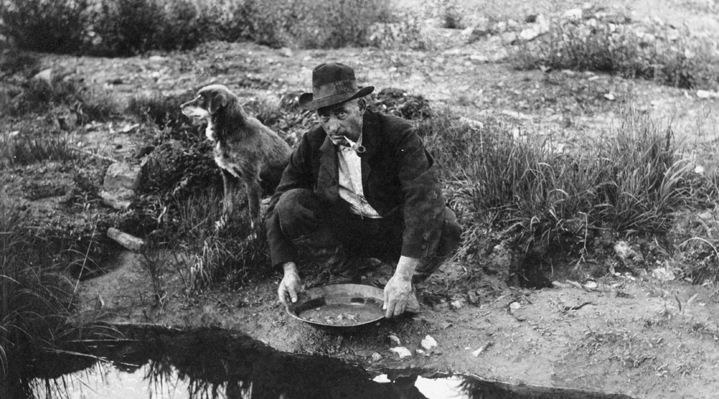 man panning for gold, metaphor for sifting through blogging ideas